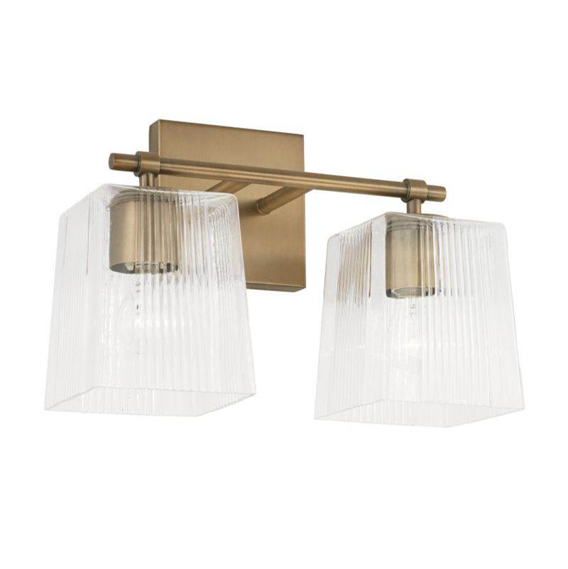 Capital Lighting Lexi 2-Light Vanity in Aged Brass with Clear Fluted Glass