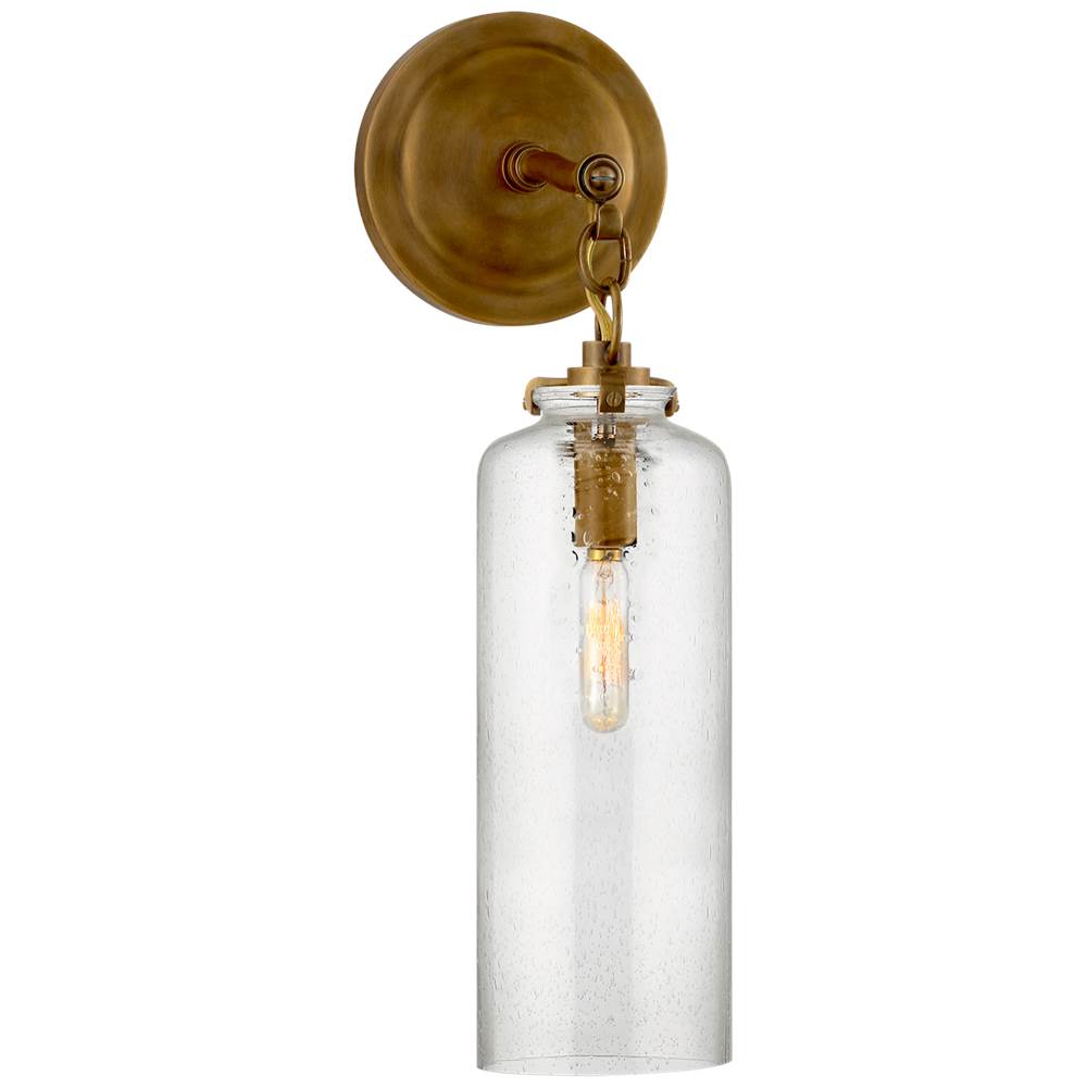 Visual Comfort Signature Collection Katie Small Cylinder Sconce in Hand-Rubbed Antique Brass with Seeded Glass